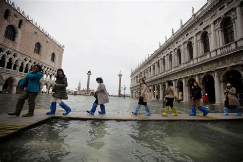 celine store venice flooded|Venice walkway flooding.